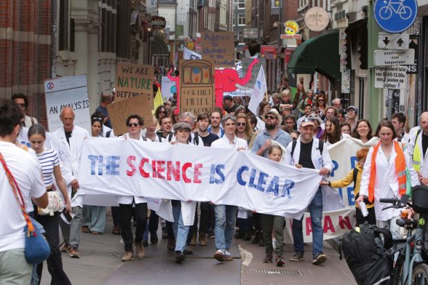 Scientist Rebellion activists from environmental organisations attend the Scientist Rebellion protest against climate change to illustrate Beware the public backlash  from ‘science triumphalism’